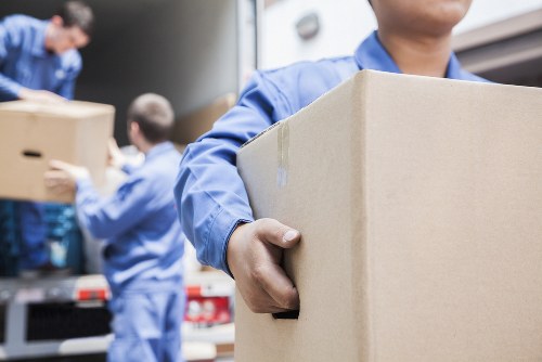 Local house movers loading furniture for a Preston home relocation