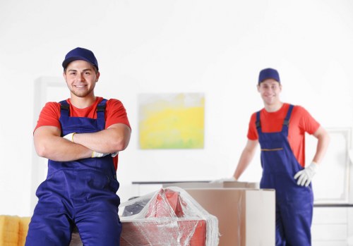 Furniture pick-up service collecting a sofa from a Preston home