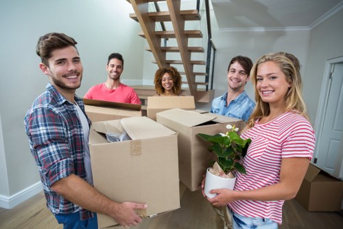 Local moving team handling fragile packing in a Preston property
