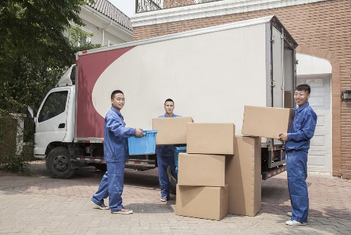 Packed boxes and furniture prepared for man and van removals in Preston
