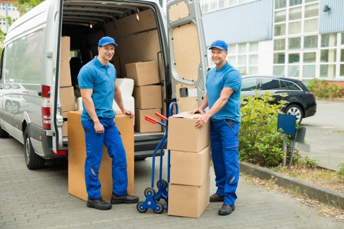 Man with van Preston service agreement concept with moving van and paperwork