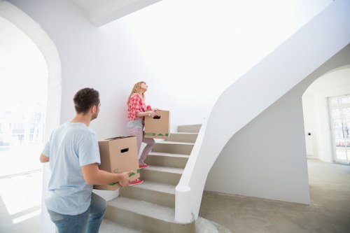 Team removing bulky household furniture from a local property in Preston