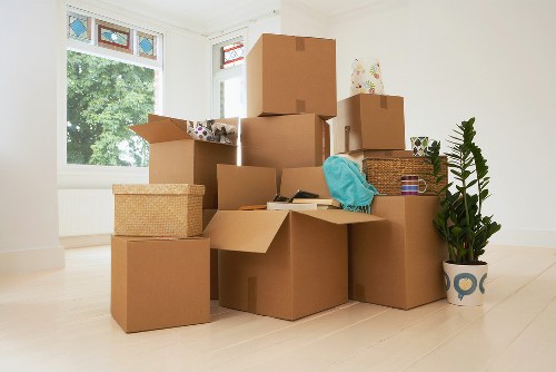 Organised packing materials and labelled boxes ready for relocation