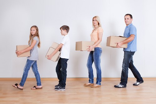 Man with van Preston handling boxes and household items